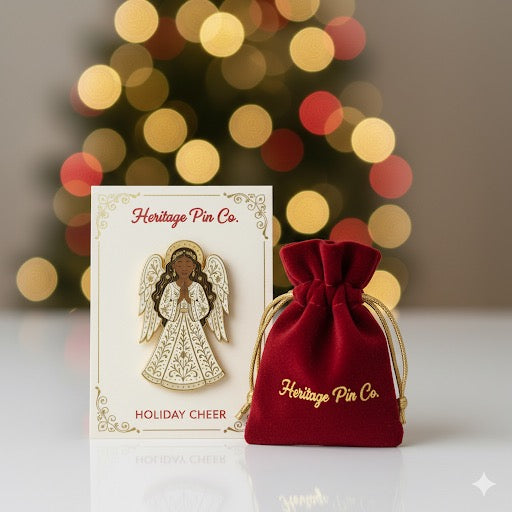 Angel enamel pin on Heritage Pin Co. backer card with velvet gift bag, faith-inspired holiday collectible